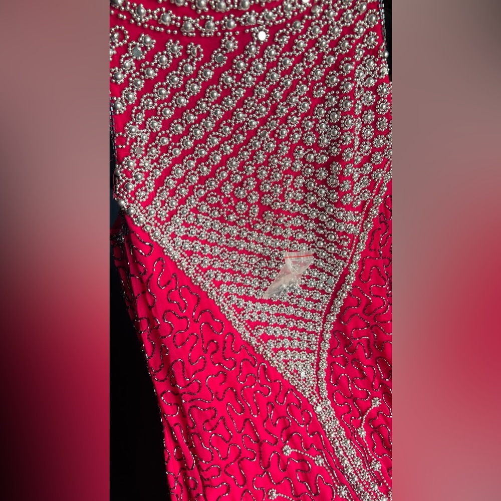 Size 10 beautiful beaded dress , it says xl India dress . Never been worn